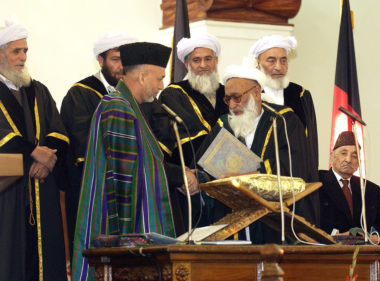 2004 Hamid Karzai takes office