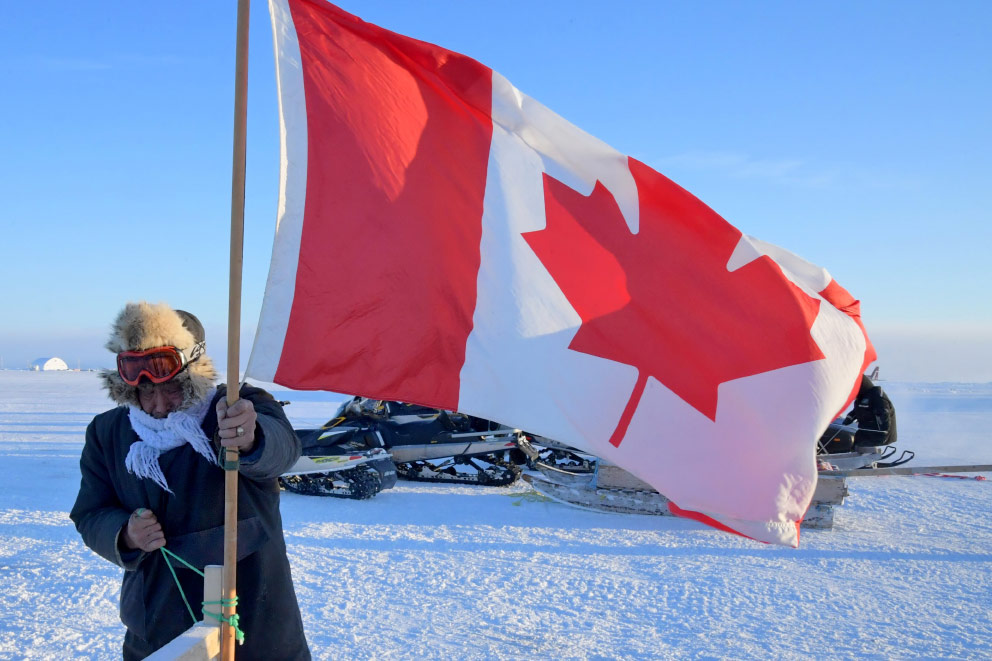 1965 Canada adopts its current national flag showing a maple leaf