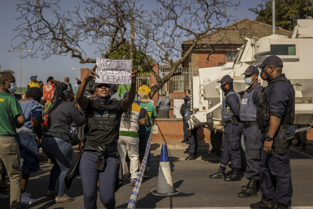 1985 South African Police kill at least 21 black people commemorating a similar mass shooting 25 years before