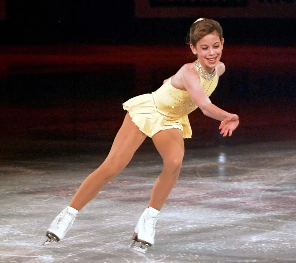 1997 Tara Lipinski becomes the youngest female figure skating world champion