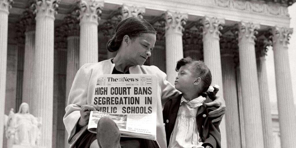 1954 The U.S. Supreme Court declares racially segregated public schools unconstitutional