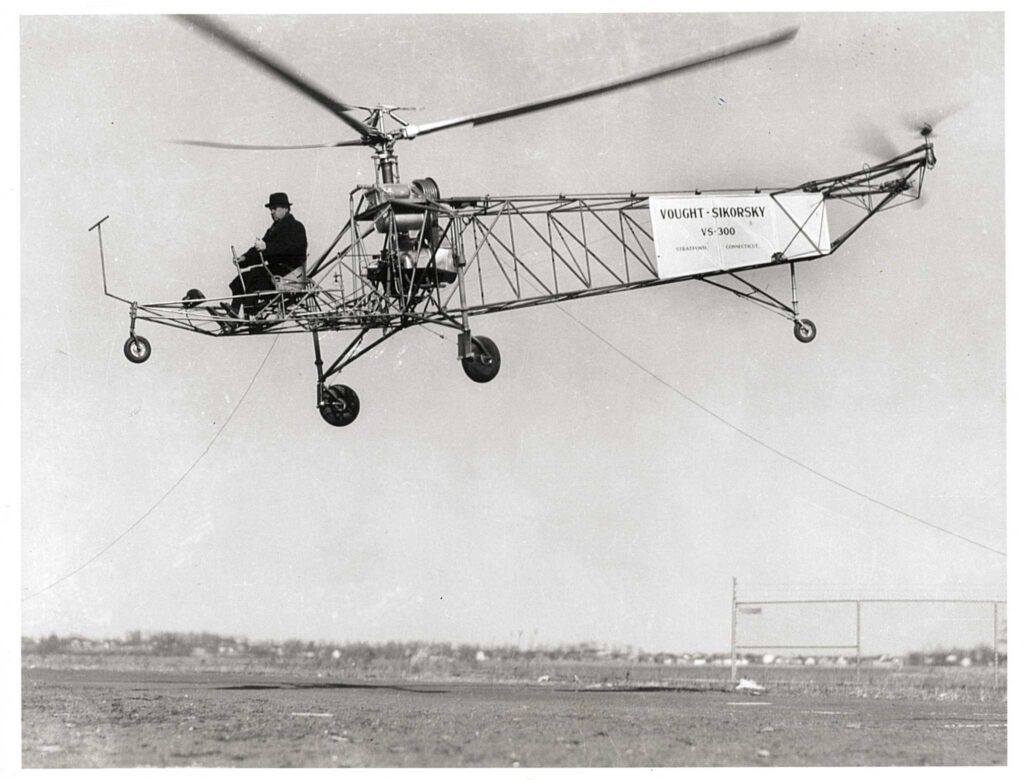 1940 Igor Sikorsky pilots his VS-300 helicopter's maiden flight